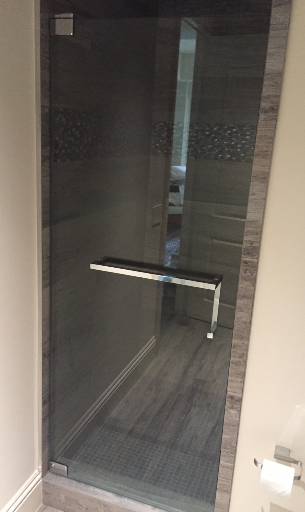frameless shower door with towel bar/pull combo