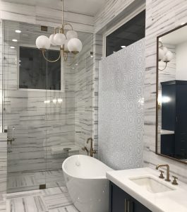 comparing frame-less shower enclosures